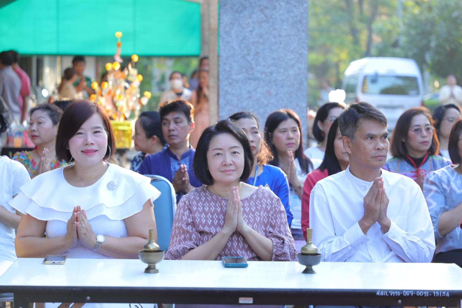 Office of the Secretary (OST) participated in a merit-making activity by offering dry food and rice to 9 monks on the occasion of the New Year 2025.